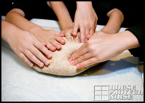 hands-kneading-dough
