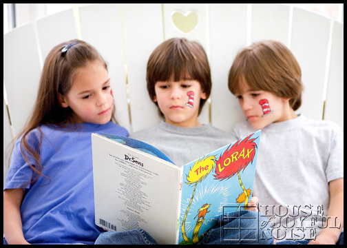 triplets-kids-reading-dr-seuss-book