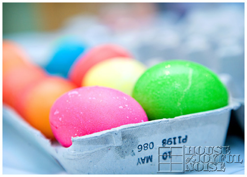bright-colored-easter-eggs-in-carton