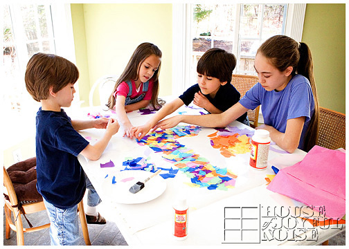 Paper crafts for children. Application of children's creativity.  Kindergarten and craft school. On a beige background, a funny face of a man  made of colored paper. 18906892 Stock Photo at Vecteezy