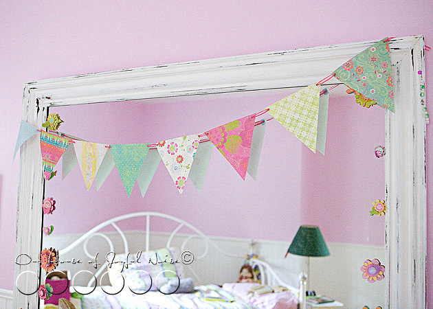 eyeletted-paper-pennants-room-decor-tutorial-10