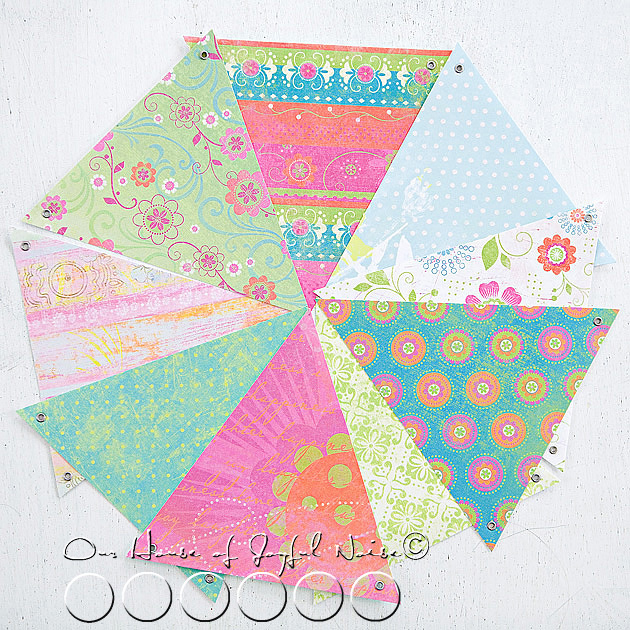 eyeletted-paper-pennants-room-decor-tutorial-5